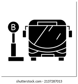 Bus stop glyph icon. Bus waiting for passengers outside. Urban and suburban transit. Outline drawing. City infrastructure concept.Filled flat sign. Isolated silhouette vector illustration