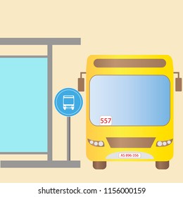 Bus stop with yellow bus
