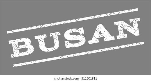 Busan watermark stamp. Text tag between parallel lines with grunge design style. Rubber seal stamp with dirty texture. Vector white color ink imprint on a gray background.