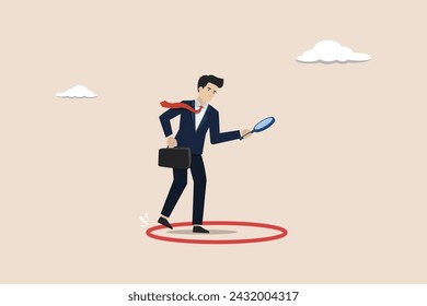Business boundary, limitation that prevent progress work, prohibited activity that limit business or career growth concept, frustrated businessman standing uncomfortably in small red circle.