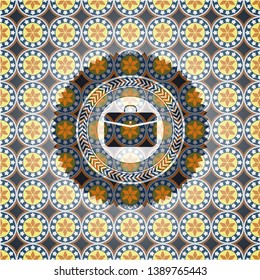 business briefcase icon inside arabic badge. Arabesque decoration.