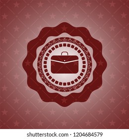 business briefcase icon inside badge with red background