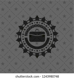 business briefcase icon inside black emblem