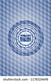 business briefcase icon inside blue badge with geometric pattern.