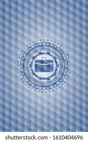 business briefcase icon inside blue polygonal badge.