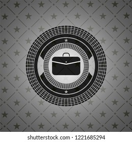 business briefcase icon inside dark emblem. Retro