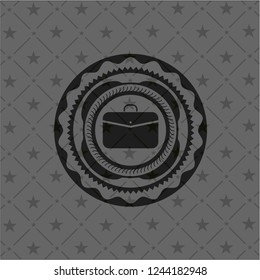 business briefcase icon inside dark badge or emblem