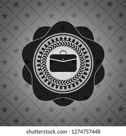 business briefcase icon inside dark badge