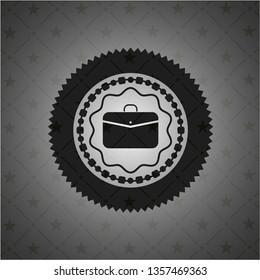 business briefcase icon inside dark badge