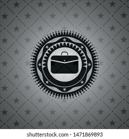 business briefcase icon inside dark emblem