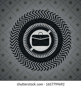business briefcase icon inside dark badge or emblem