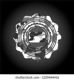 business briefcase icon inside grey camouflaged emblem