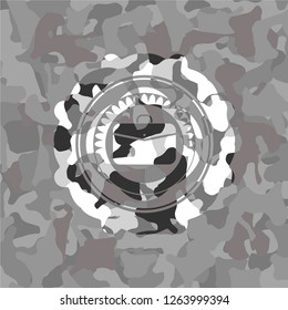 business briefcase icon inside grey camouflage texture