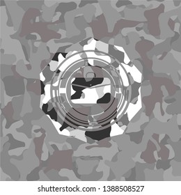 business briefcase icon inside grey camouflaged emblem