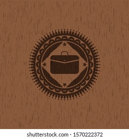 business briefcase icon inside realistic wooden emblem