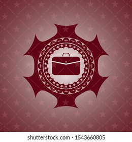 business briefcase icon inside red emblem