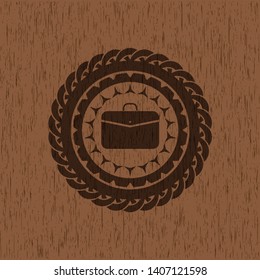 business briefcase icon inside retro wood emblem