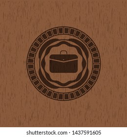 business briefcase icon inside retro wooden emblem