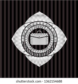 business briefcase icon inside silver emblem