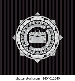business briefcase icon inside silver emblem