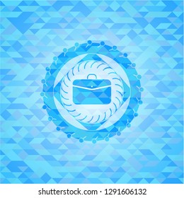 business briefcase icon inside sky blue emblem with mosaic ecological style background