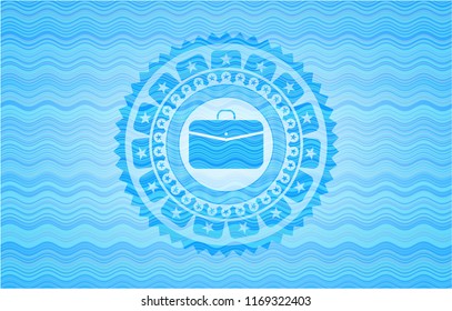 business briefcase icon inside water concept style emblem.