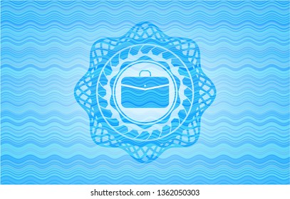 business briefcase icon inside water wave representation style emblem.