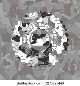 business briefcase icon on grey camouflaged texture