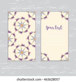 The business card or card with abstract pattern, roundabout. Lilac, blue, orange, yellow colors in a circle.