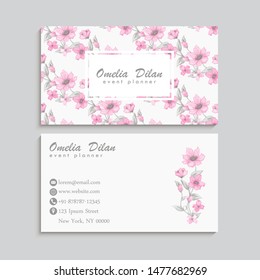 Business card with beautiful pink watercolor flowers. Template