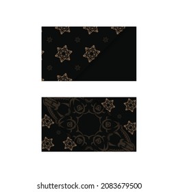 Business card in black with abstract brown ornament for your contacts.