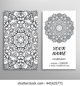 Business Card with black and white geometric pattern and mandala round ornament. Vintage decorative elements, logo, icon label design. Abstract graphic illustration
