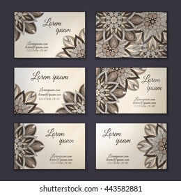 Business card collection, delicate floral mandala pattern. Vintage decorative elements. Hand drawn background.Islam, Arabic, Indian, ottoman motifs