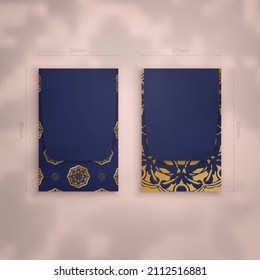 Business card in dark blue with a gold mandala pattern for your business.