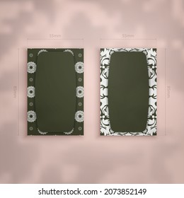 Business card in dark green color with mandala white ornament for your business.