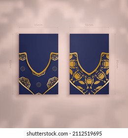 Business card in deep blue with antique gold ornaments for your personality.