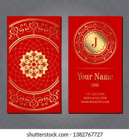 A business card with a gold mandala and a monogram on red background. Vector illustration.