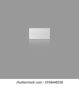 Icono de tarjeta de visita con reflexión sobre fondo gris