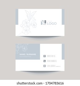 Business card layout with apple blossom drawing.