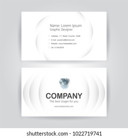 Business card on white background with copy space.
