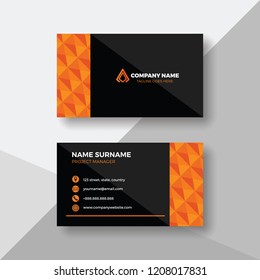 Business card with orange polygon pattern