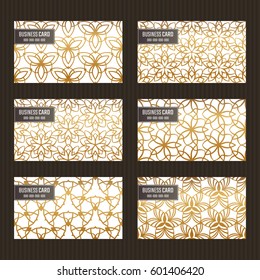 Business card set. Golden foil decorative elements. Ornamental floral cards with ornate patterns. Islamic, arabic, indian, turkish, pakistan, chinese, japanese, asian motifs. Vector illustration.