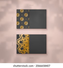 Business card template in black color with abstract gold ornament for your contacts.