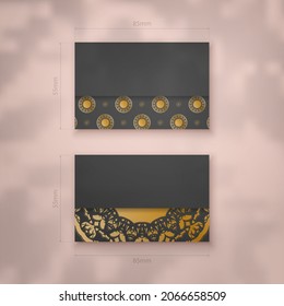 Business card template in black with Indian gold pattern for your business.