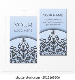 Business card template in Blue color with luxurious black ornaments. Print-ready business card design with vintage patterns.