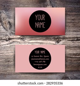 Business card template with creative geometric pattern on wooden background