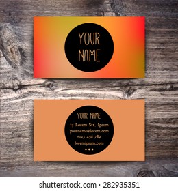 Business card template with creative geometric pattern on wooden background