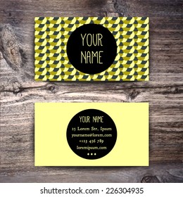 Business card template with creative retro pattern on wooden background