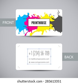 Business card template for printery with ink splashes elements in a CMYK color scheme isolated.  Vector card with colorful stains and blots for printing house branding and other design concepts