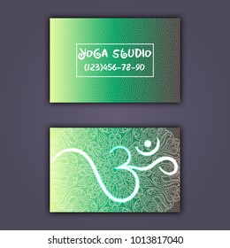 Business card for yoga studio or yoga instructor. Ethnic background with mandala ornament and ohm.